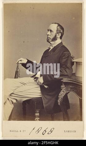 Homme non identifié avec bouc, moustache et muttonchops, assis, en profil. Henry Maull & Co Banque D'Images