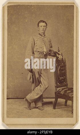 Portrait d'un soldat confédéré debout sur une chaise ornée, avec une casquette. Galerie des jeunes Banque D'Images