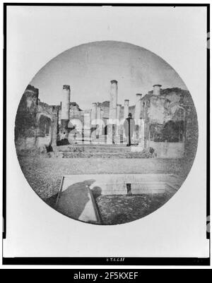 Vue arrière d'Alexander Graham Bell entrant dans les ruines de Pompéi Banque D'Images