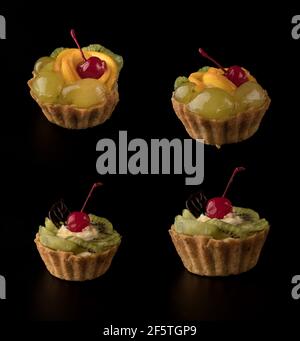 Gâteau de dessert aux fruits avec cerises, shekolad, éponges de raisin, tranches de kiwi et tranches d'orange, sur fond noir isolé, collage Banque D'Images