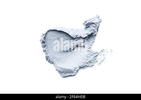 Frottis d'argile cosmétique sur fond blanc. Banque D'Images