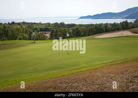 Joueur de golf sur le green, Villasimius Banque D'Images