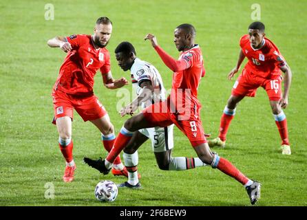 Luxembourg, Luxembourg. 30 mars 2021. Nuno Mendes du Portugal entre Maxime Chanot, Christopher Martins, Leandro Barreiro du Luxembourg pendant la coupe du monde de la FIFA 2022, qualificatifs, Group A football match entre le Luxembourg et le Portugal le 30 mars 2021 à Josy Barthel à Luxembourg, Luxembourg - photo Jean Catuffe/DPPI crédit: DPPI Media/Alay Live News Banque D'Images