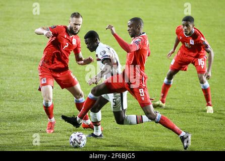 Nuno Mendes du Portugal entre Maxime Chanot, Christopher Martins, Leandro Barreiro du Luxembourg pendant la coupe du monde de la FIFA 2022, qualificatifs, Group A football match entre Luxembourg et Portugal le 30 mars 2021 à Josy Barthel à Luxembourg, Luxembourg - photo Jean Catuffe / DPPI / LiveMedia Banque D'Images