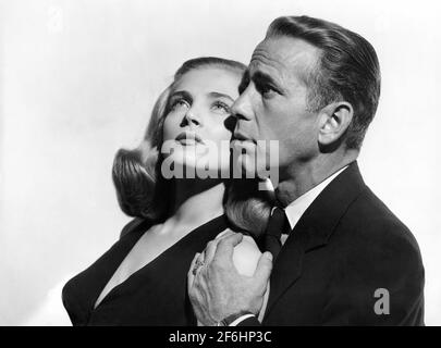 LIZABETH SCOTT et HUMPHREY BOGART portrait publicitaire pour L'ESTIME 1947 réalisateur JOHN CROMWELL robe Jean Louis Columbia photos Banque D'Images