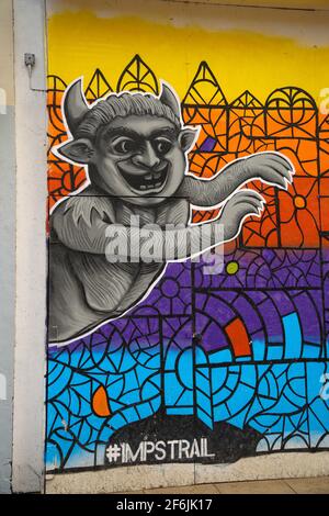 Légende de l'Imp Lincoln, cathédrale de Lincoln, emplacements dans le Lincolnshire, ancienne légende, diable a envoyé ses imp, vieux magasin, graffiti colorés. Banque D'Images