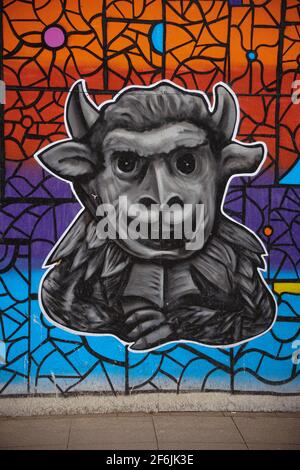 Légende de l'Imp Lincoln, cathédrale de Lincoln, emplacements dans le Lincolnshire, ancienne légende, diable a envoyé ses imp, vieux magasin, graffiti colorés. Banque D'Images