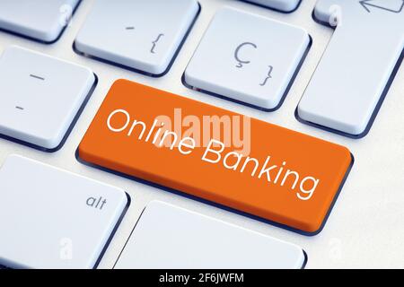 Mot bancaire en ligne sur la touche de clavier d'ordinateur de couleur orange Banque D'Images