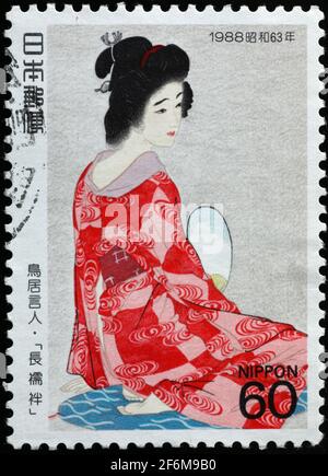 Geisha sur le timbre japonais Banque D'Images