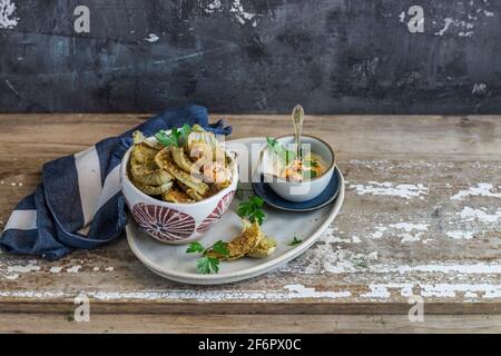 Gratin de fenouil avec chapelure et persil Banque D'Images