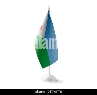 Petit drapeau national de Djibouti sur fond blanc Banque D'Images