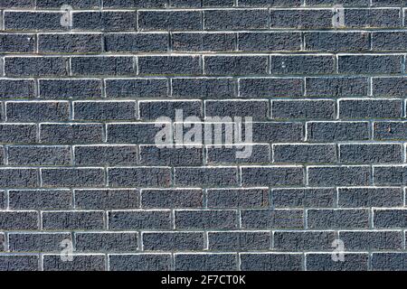 Fond de mur de brique noire variété de briques mur de brique fait Avec de nouvelles briques de maison régulières photo haute résolution de haute qualité Banque D'Images