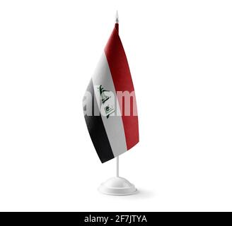 Petit drapeau national de l'Irak sur fond blanc Banque D'Images