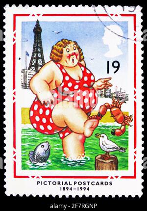 MOSCOU, RUSSIE - 17 JANVIER 2021 : timbre-poste imprimé au Royaume-Uni montre le Bather à Blackpool, Centenaire de la série de cartes postales, vers 1994 Banque D'Images