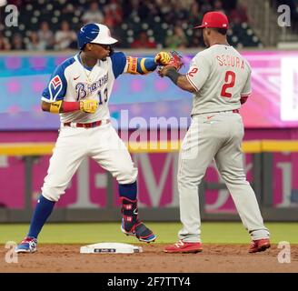 Atlanta, États-Unis. 09e avril 2021. Ronald Acuna Jr. D'Atlanta Braves (13) plaisante avec le shortstop de Philadelphie Phlilies Jean Segura (2) après avoir frappé un double dans la troisième intingon lors de leur jour d'ouverture contre les Phillies de Philadelphie au Truist Park à Atlanta le vendredi 9 avril 2021. Photo de Tami Chappell/UPI crédit: UPI/Alay Live News Banque D'Images