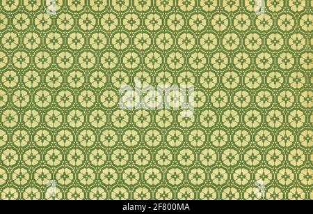 Papier peint floral vintage utilisé en vert et jaune - naturel surface de papier granuleuse Banque D'Images