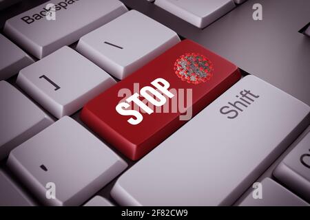 Clavier d'ordinateur avec signal d'arrêt contre le virus Covid-19 comme clé Banque D'Images