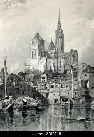 Une vue historique de Saint-Omer et de la cathédrale de Strasbourg, en France, tirée d'une copie originale de C. Stanfield R.A. et W. Richardson. Il y a des maisons à colombages en face avec des bateaux de la rivière Ill. c. 1850s. Banque D'Images