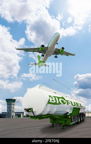 Avion et remorque-citerne biocombustible en arrière-plan de l'aéroport. Nouvelles sources d'énergie Banque D'Images