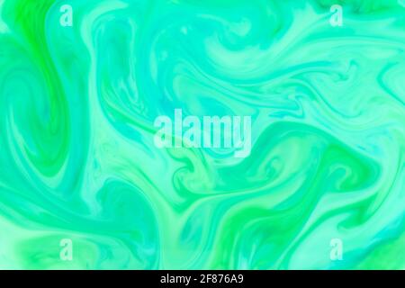 Motif abstrait vert frais de tourbillonnage ou d'écoulement de l'encre une conception monochromatique abstraite comme modèle ou texture d'arrière-plan pour concept eco ou bio Banque D'Images