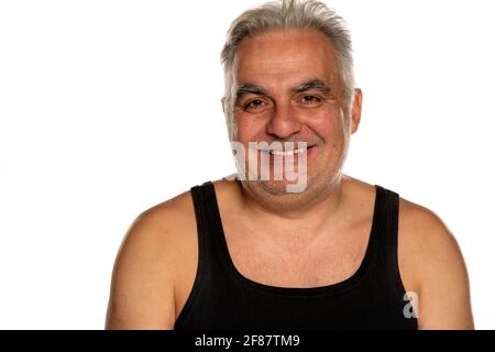 Heureux non rasé homme d'âge moyen avec de courts cheveux gris Banque D'Images