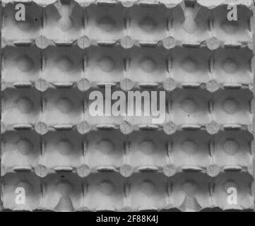 Côté extérieur du plateau à œufs de poulet en papier recyclé, arrière-plan abstrait Banque D'Images