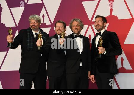 Gagnant effets visuels Premier homme Paul Lambert Ian Hunter Tristan Myles JD Schwalm dans la salle de presse lors de la 91e cérémonie annuelle des Oscars, tenue au Dolby Theatre à Hollywood, Californie, le dimanche 24 février 2019 photo par Jennifer Graylock-Graylock.com 917-519-7666 Banque D'Images