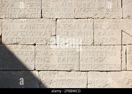 Arrière-plan en pierre ancienne avec une inscription ancienne. Banque D'Images