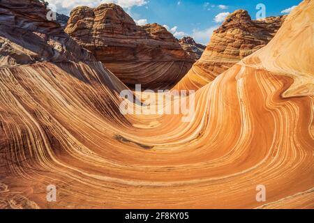 La vague est une formation de grès striée dans les buttes de Coyote Nord, dans la région sauvage de Paria Canyon-Vermilion Cliffs, dans le monument national de Vermilion Cliffs, à Arizo Banque D'Images