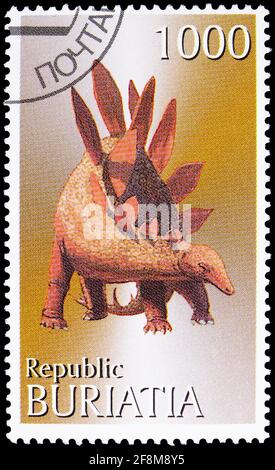 MOSCOU, RUSSIE - 4 OCTOBRE 2019 : timbre-poste imprimé à Cendrillon (Buryatia, Russie) montre Stegosaurus, série, vers 1997 Banque D'Images