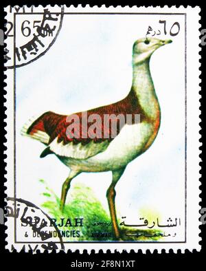 MOSCOU, RUSSIE - 4 OCTOBRE 2019 : timbre-poste imprimé à Sharjah montre le Grand Bustard (Otis tarda), série d'oiseaux, vers 1972 Banque D'Images