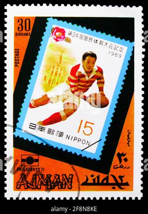 MOSCOU, RUSSIE - 4 OCTOBRE 2019 : timbre-poste imprimé à Ajman (Émirats arabes Unis) montre Timbre du Japon, Rugby, exposition internationale de timbres Banque D'Images