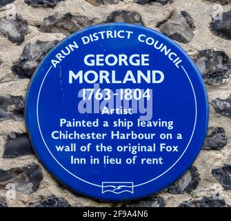 Arun District Council plaque bleue sur le mur du Fox Inn, Felphan, West Sussex, Angleterre, Royaume-Uni - George Morland 1763-1804 Banque D'Images