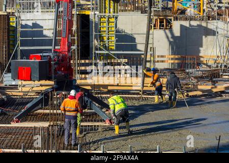 Wien, Vienne: Travaux de bétonnage sur chantier, ouvrier en 22. Donaustadt, Wien, Autriche Banque D'Images