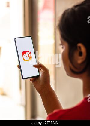 Assam, inde - 30 mars 2021 : image de base du logo GarageBand sur l'écran du téléphone. Banque D'Images