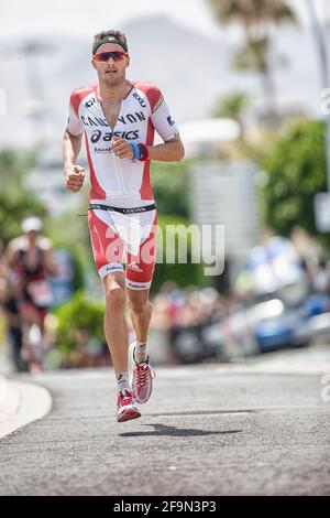 Lanzarote 2016. Jan Frodeno courant à pied dans le Lanzarote Ironman 2016. Banque D'Images