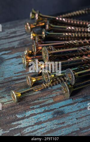 Vis autotaraudeuses structurelles pour embout Torx 25. Abstraction de construction. Arrière-plan industriel. Banque D'Images