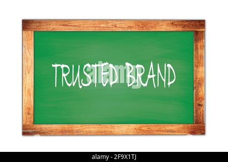 TEXTE DE MARQUE DE CONFIANCE écrit sur le tableau noir vert de l'école de cadre en bois. Banque D'Images