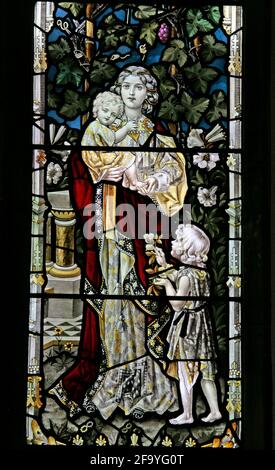 Détail d'un vitrail par Ward et Hughes représentant la parabole de la femme vertueuse, All Saints Church, Allesley, Coventry Banque D'Images