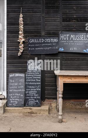 Cafe menu board on the island of Morro de Sao Paulo on the north east  Atlantic coastline of the Bahia Region of Brazil Stock Photo - Alamy