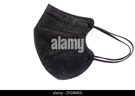 Masque noir jetable avec contour d'oreille, FFP2 avec protection N95 / KN95. Masque pour vous protéger et protéger les autres contre Covid-19. Sans valeur respiratoire Banque D'Images