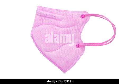 Masque rose jetable avec contour d'oreille, FFP2 avec protection N95, KN95. Masque pour vous protéger et protéger les autres contre Covid-19. Sans valve respiratoire Banque D'Images
