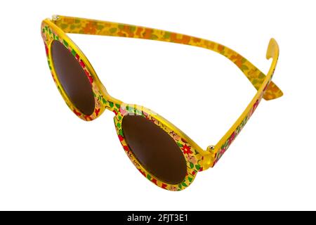 Paire d'enfants filles fleurs jaunes Mini Boden lunettes de soleil isolé sur fond blanc Banque D'Images