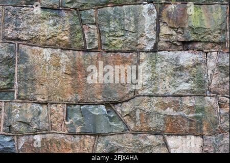 Close up d'un vieux mur de pierre Banque D'Images