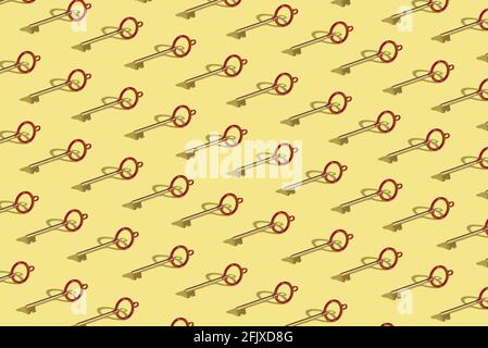 Fond d'écran avec touche disposée dans le motif sur un jaune arrière-plan Banque D'Images