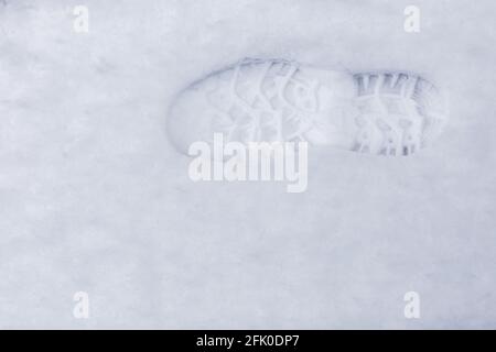 Gros plan d'un imprimé pied dans la neige sur Hergensweiler, dans le sud de l'Allemagne. Banque D'Images