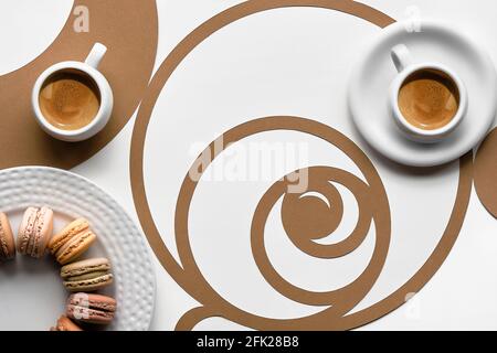 Tasses à café, macarons, cercles de séquence Fibonacci. Espresso, perfection savoureuse. Golden ratio concept, paper Art. Vue de dessus, plat dans deux tons, blanc Banque D'Images