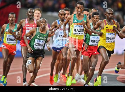 Jacob Kiplimo (Ouganda), Yomif Kejelcha (Éthiopie), Emanuel Gisamoda (Tanzanie). 5000 mètres hommes, qualification. Championnats du monde de l'IAAF Londres 2017 Banque D'Images