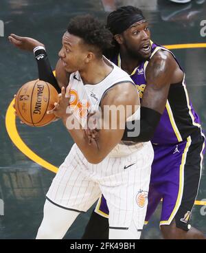 Orlando, États-Unis. 26 avril 2021. LA forward Montzl Harrell, à droite, réagit à être appelé à une faute alors qu'il garde le centre d'Orlando Wendell carter Jr. Pendant le match Los Angeles Lakers à Orlando Magic NBA au centre Amway le lundi 26 avril 2021. Los Angeles a gagné le match 114-103. (Photo de Stephen M. Dowell/Orlando Sentinel/TNS/Sipa USA) crédit: SIPA USA/Alay Live News Banque D'Images