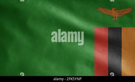 Drapeau zambien agitant dans le vent. Gros plan de la bannière zambienne soufflant, douce et lisse soie. Tissu texture ensign arrière-plan. Utilisez-le à l'échelle nationale Banque D'Images